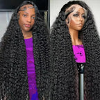 Person wearing a black wig with a purple shirt, next to a mannequin head with a similar wig.