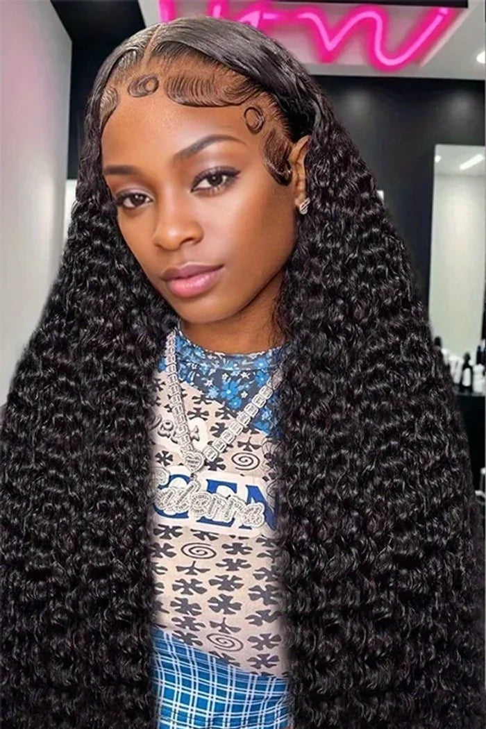 Model wearing a long black deep wave 13x6 lace frontal wig with a styled hairline