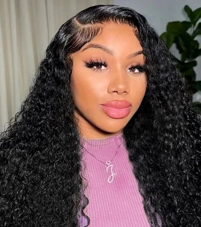 Model wearing a long black curly lace wig from the deep wave line